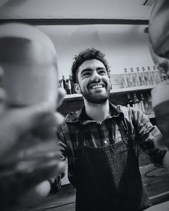 Bartender serving guests